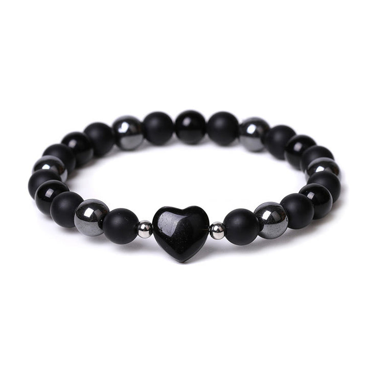 Braccialetto di protezione del cuore dell'amore di cristallo della pietra dell'occhio di tigre di onice nero Buddha Stones