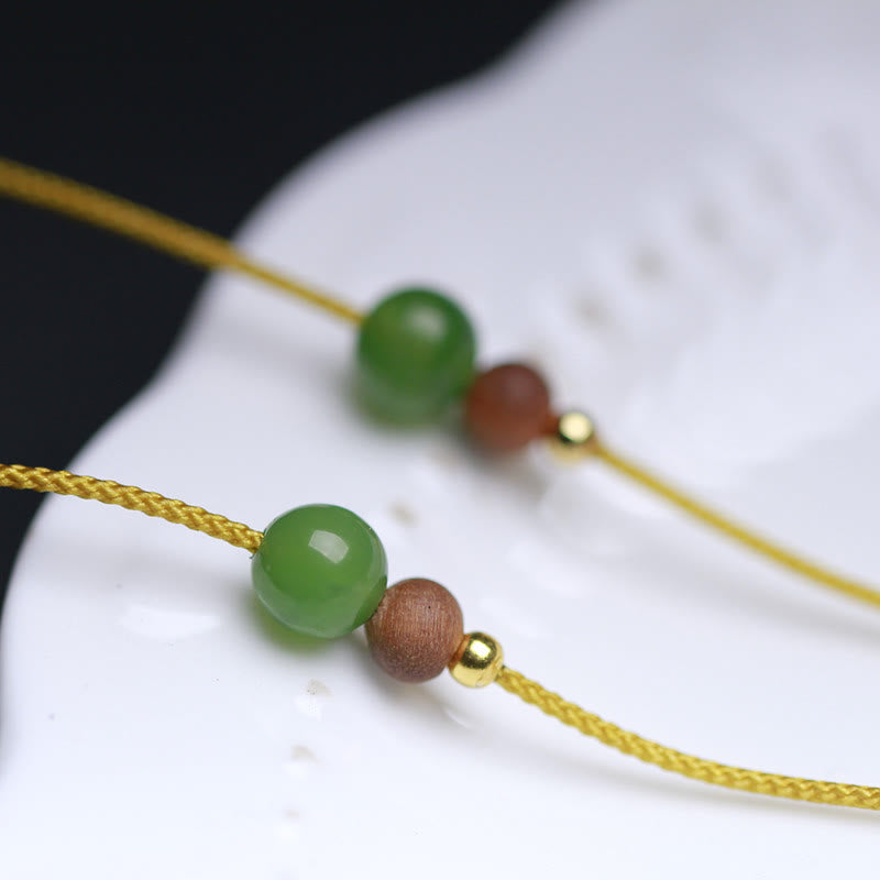 Collana con ciondolo in corda della prosperità con motivo a piccola borsa in giada naturale di Hetian