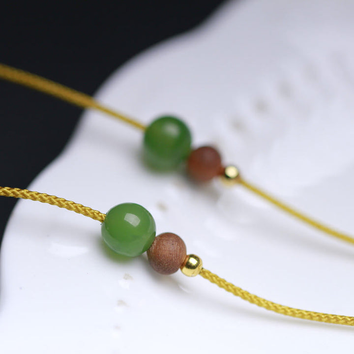 Collana con ciondolo in corda della prosperità con motivo a piccola borsa in giada naturale di Hetian