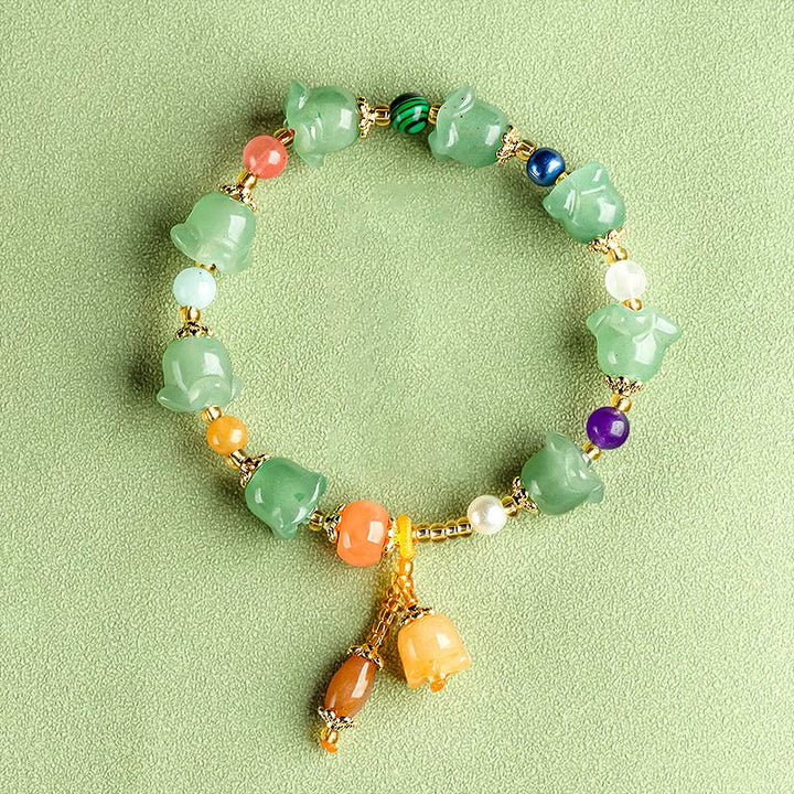 Braccialetto della fortuna con fiore di magnolia, avventurina verde Buddha Stones