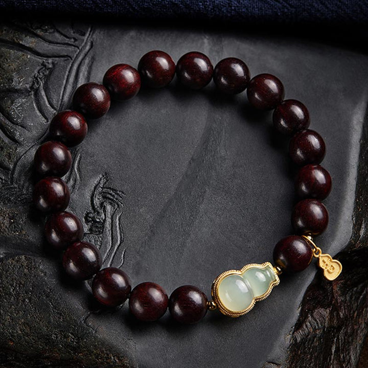 Braccialetto di rilassamento calmo con piccole foglie di sandalo rosso, zucca e giada Buddha Stones