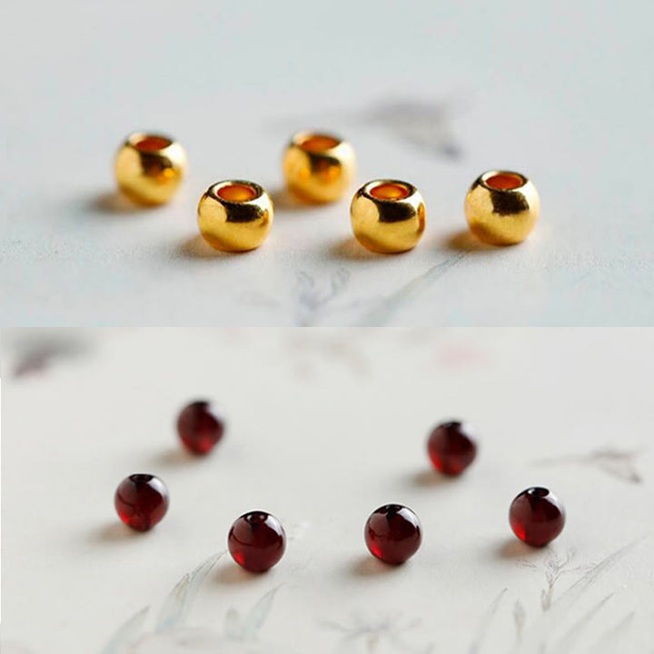 Braccialetto di protezione in granato naturale con pesce koi in oro 999 Buddha Stones