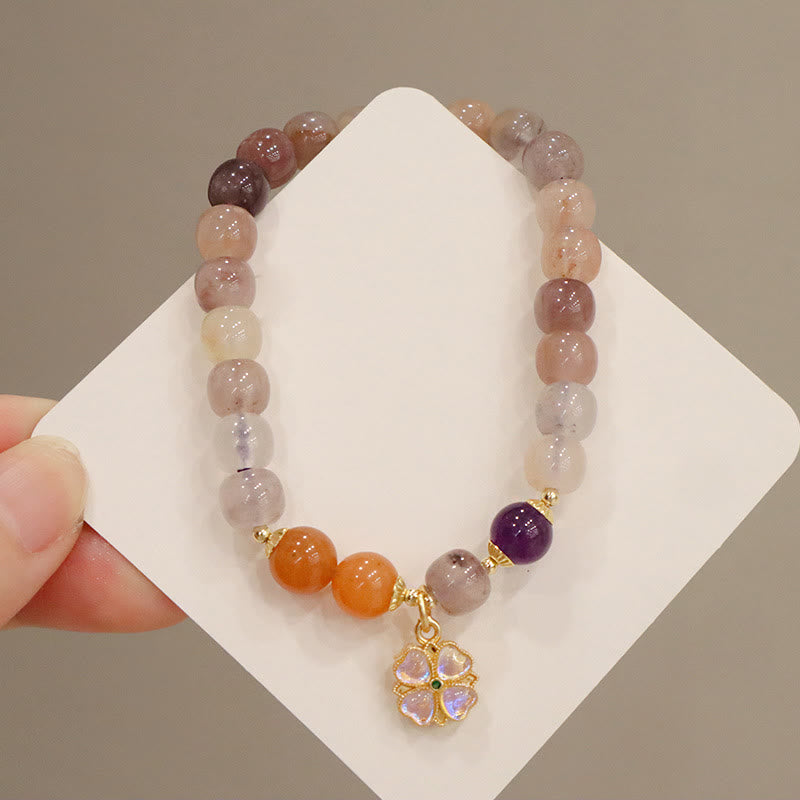 Braccialetto di perline con ciondolo a forma di fiore viola dorato naturale di seta Buddha Stones