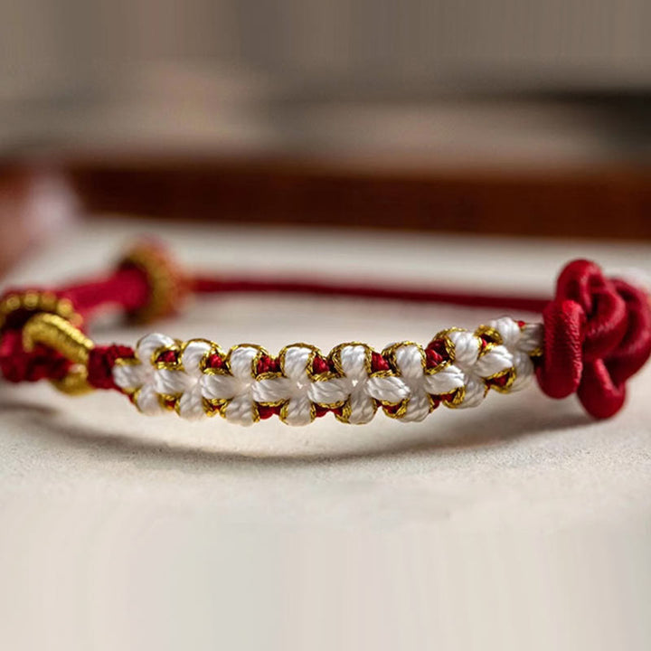 Braccialetto con corda portafortuna con ciondolo a forma di fiore di pesco con nodo d'amore fatto a mano Buddha Stones