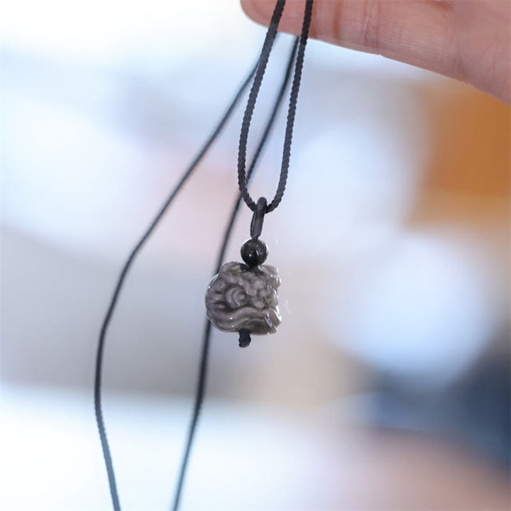Collana con ciondolo di protezione del leone danzante in ossidiana lucida d'argento naturale Buddha Stones