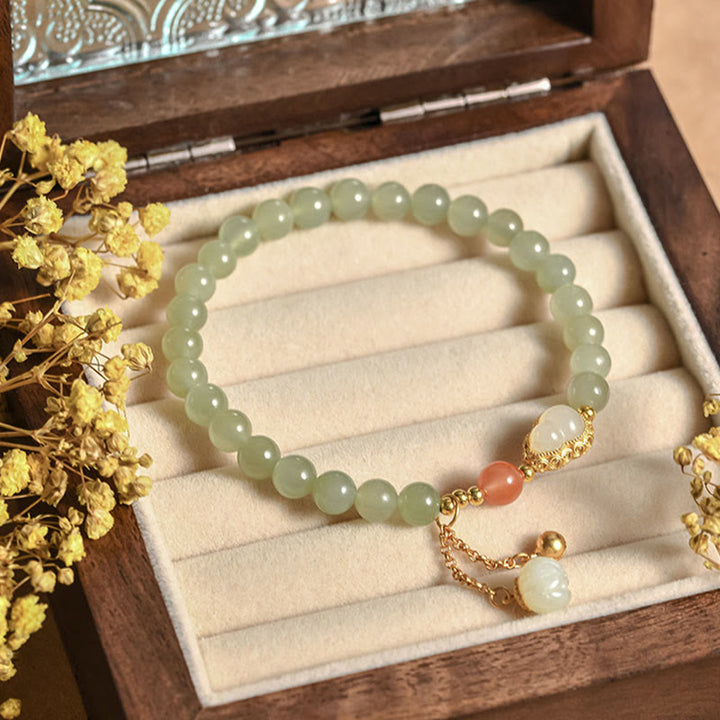 Braccialetto portafortuna in argento sterling 925 con giada Hetian e zucca di loto