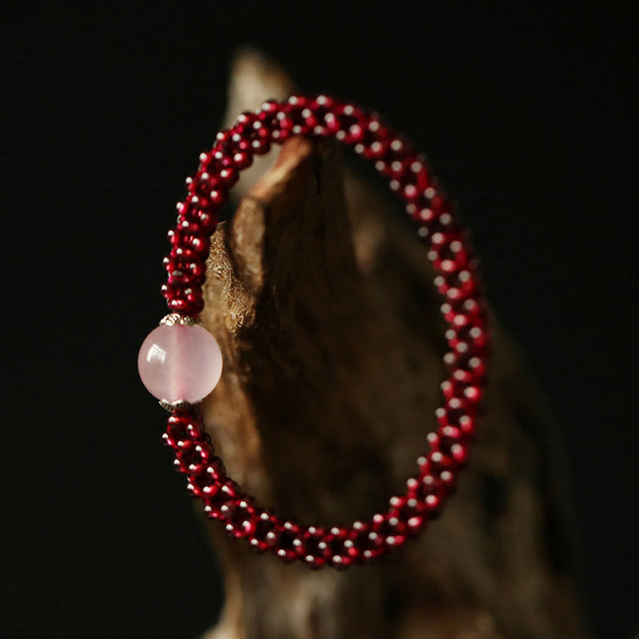 Braccialetto di protezione con perline di agata rossa, cristallo rosa e granato naturale Buddha Stones