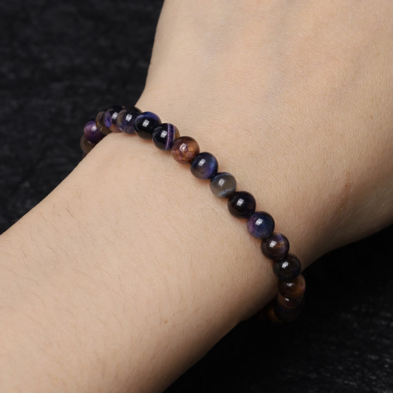Braccialetto di protezione naturale con occhio di tigre viola Buddha Stones