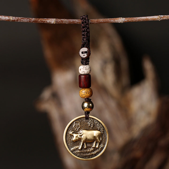 Portachiavi con decorazione in rame con zodiaco cinese e fortuna