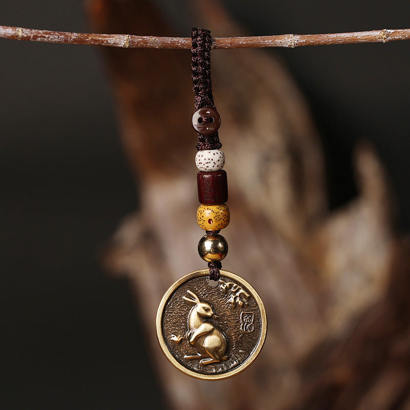 Portachiavi con decorazione in rame con zodiaco cinese e fortuna
