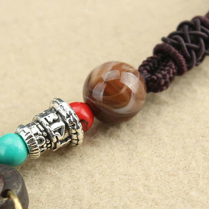 Collana pendente Thangka con cinque divinità della ricchezza in ebano tibetano