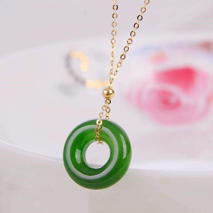 Collana con ciondolo in oro 14K con giada ciano rotonda e guarigione