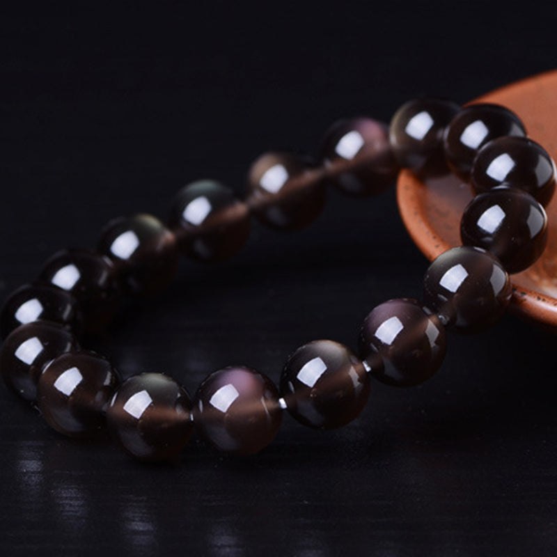 Braccialetto positivo in ossidiana arcobaleno naturale Buddha Stones