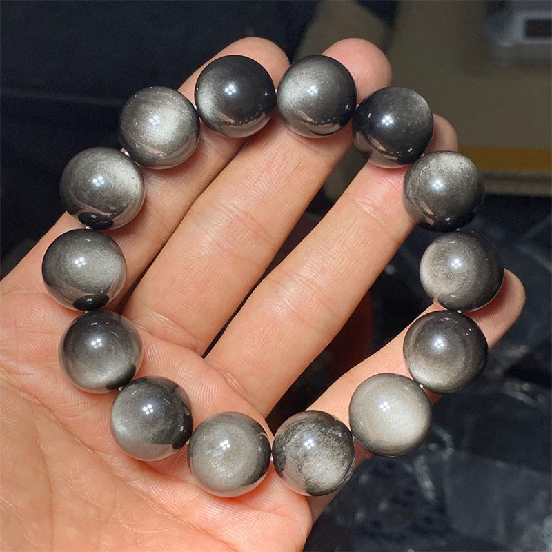 Braccialetto di protezione lenitiva in ossidiana lucida d'argento naturale Buddha Stones