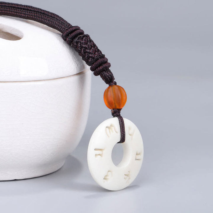Collana con ciondolo con Buddha Stones, frutto di avorio Om Mani Padme Hum e protezione - image 6