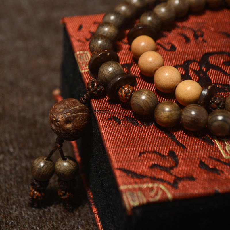 Bracciale Mala con ciondolo di protezione in legno di sandalo tibetano Buddha Stones