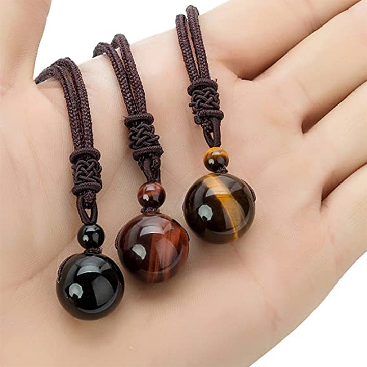 Collana di protezione con occhio di tigre tibetano Buddha Stones