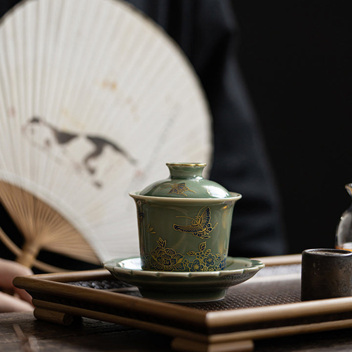 Buddha Stones Porcellana verde Farfalla Fiore Salmone Pesce Ceramica Gaiwan Sancai Tazza da tè Kung Fu Tazza da tè e piattino con coperchio