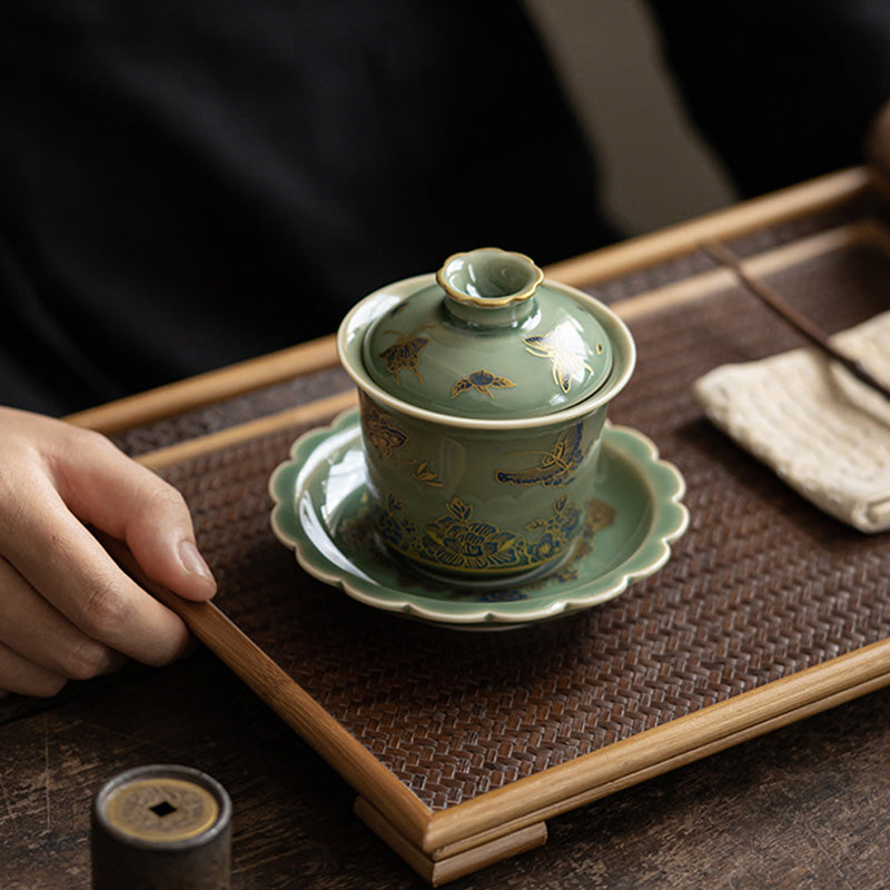 Buddha Stones Porcellana verde Farfalla Fiore Salmone Pesce Ceramica Gaiwan Sancai Tazza da tè Kung Fu Tazza da tè e piattino con coperchio