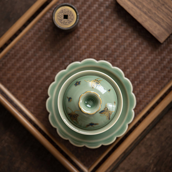 Buddha Stones Porcellana verde Farfalla Fiore Salmone Pesce Ceramica Gaiwan Sancai Tazza da tè Kung Fu Tazza da tè e piattino con coperchio