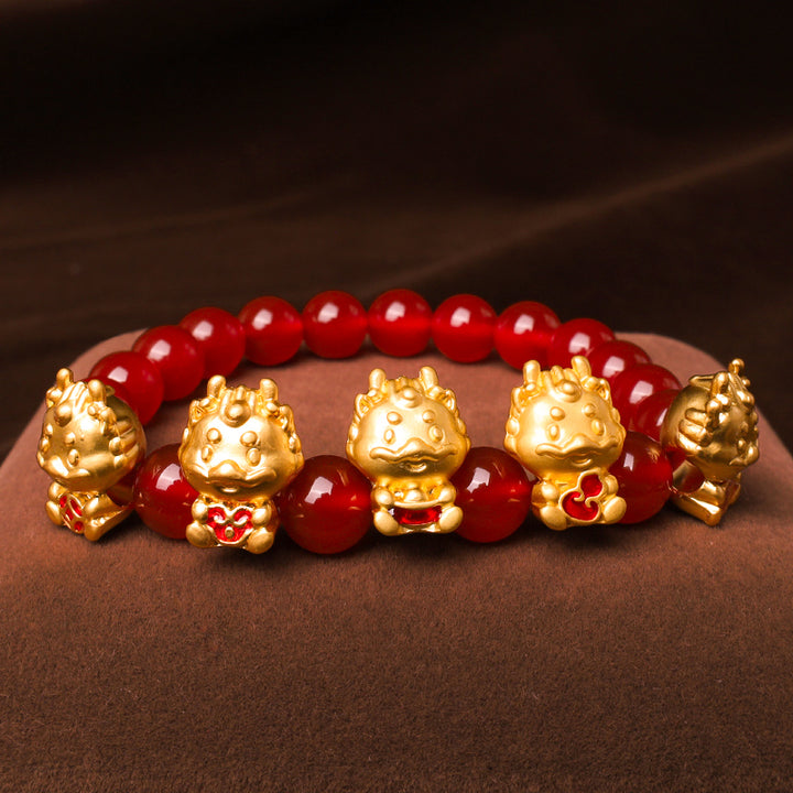 Braccialetto di protezione del carattere Fu della moneta di rame naturale di agata rossa dell'anno del drago Buddha Stones