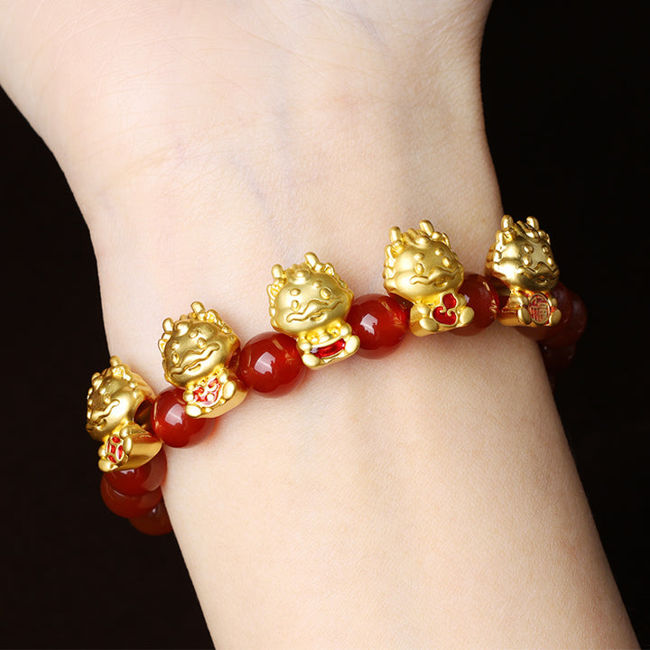 Braccialetto di protezione del carattere Fu della moneta di rame naturale di agata rossa dell'anno del drago Buddha Stones