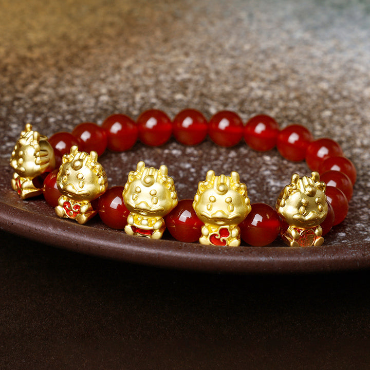 Braccialetto di protezione del carattere Fu della moneta di rame naturale di agata rossa dell'anno del drago Buddha Stones
