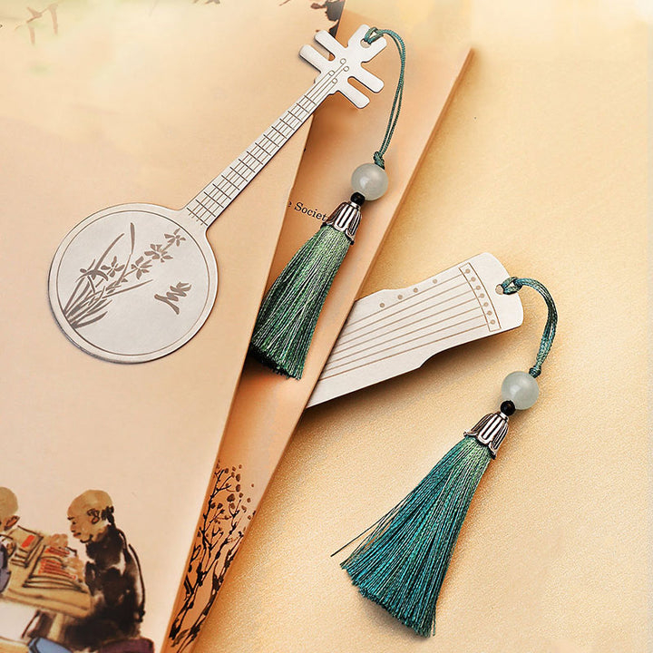 Buddha Stones Strumenti musicali classici Pipa Guzheng Guqin Ruan Segnalibri in metallo Nappa con scatola regalo