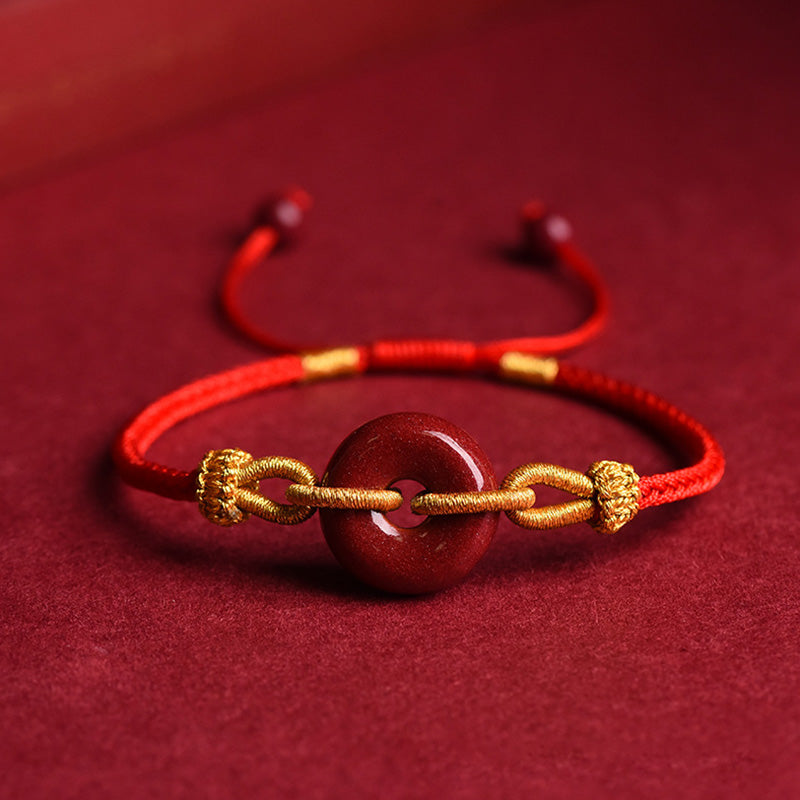 Bracciale intrecciato con motivo a fibbia per la pace in cinabro lavorato a mano Buddha Stones