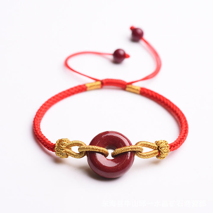 Bracciale intrecciato con motivo a fibbia per la pace in cinabro lavorato a mano Buddha Stones