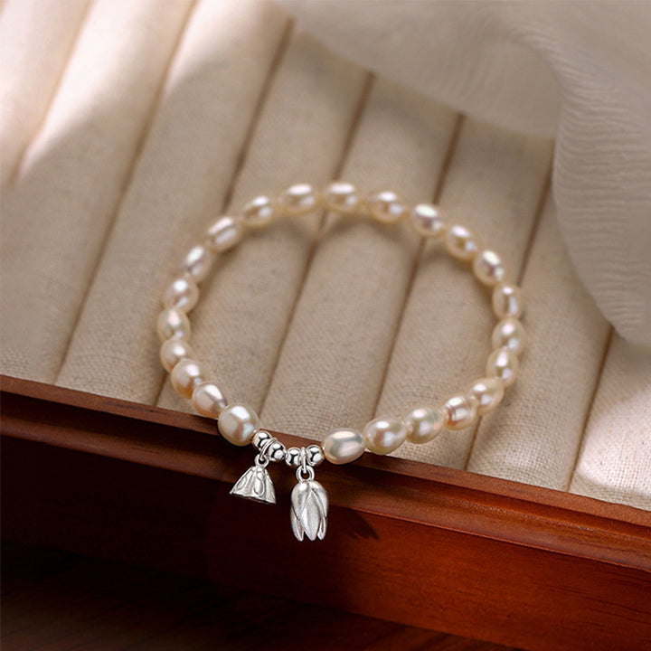 Braccialetto di guarigione in perle naturali con baccello di fiore di loto in argento sterling 999 Buddha Stones