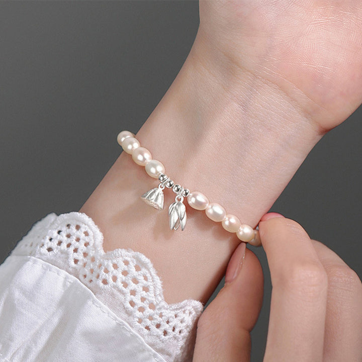 Braccialetto di guarigione in perle naturali con baccello di fiore di loto in argento sterling 999 Buddha Stones