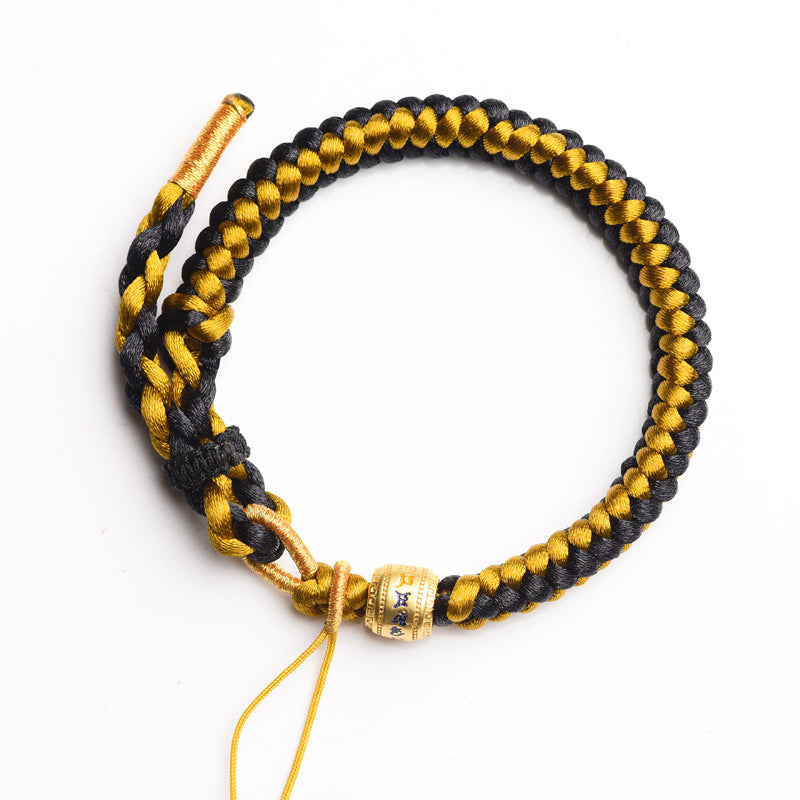 Braccialetto di purezza Om Mani Padme Hum in corda di scaglie di drago in oro nero tibetano fatto a mano con Buddha Stones