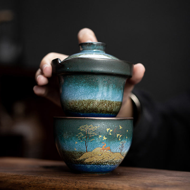 Tazza da tè in ceramica Buddha Stones Deer Mountain Trees Lovely Cat Tazza da tè nera con coperchio e borsa