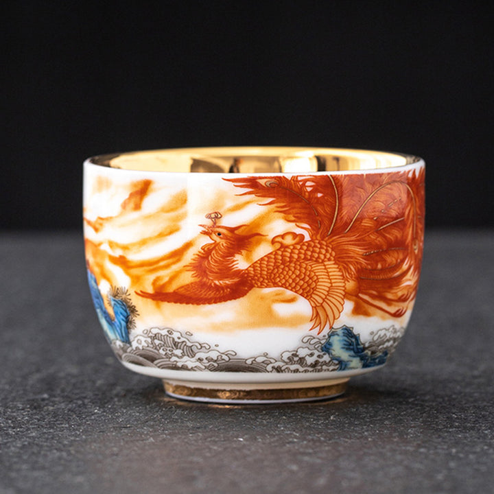 Buddha Stones Drago Fenice Gru Sole Oceano Onde Tazza da tè in ceramica dorata Tazza da tè Kung Fu 170ml