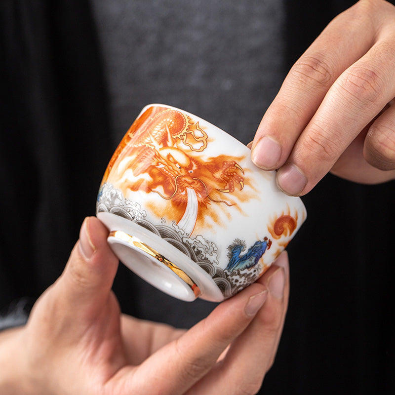 Buddha Stones Drago Fenice Gru Sole Oceano Onde Tazza da tè in ceramica dorata Tazza da tè Kung Fu 170ml