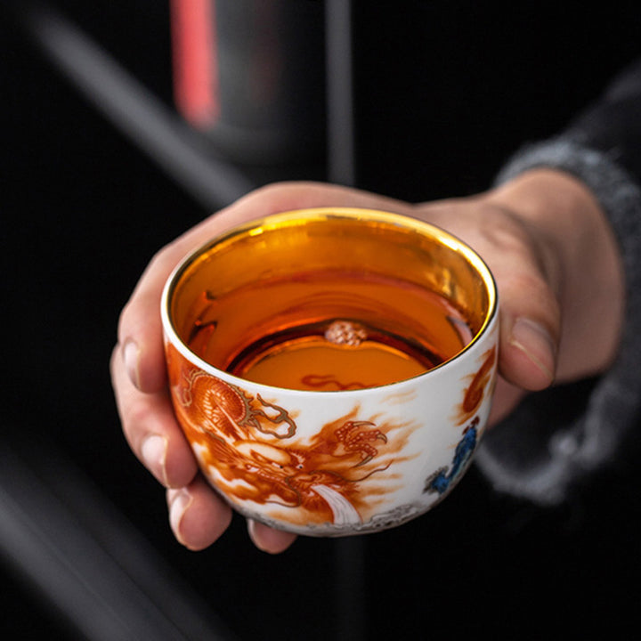 Buddha Stones Drago Fenice Gru Sole Oceano Onde Tazza da tè in ceramica dorata Tazza da tè Kung Fu 170ml