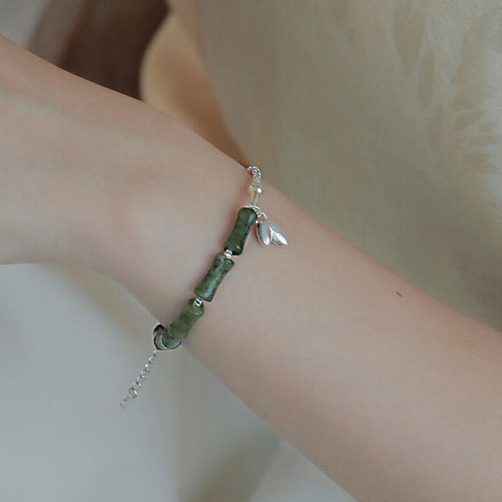 Braccialetto della fortuna con motivo di bambù e peridoto in argento sterling 925 Buddha Stones