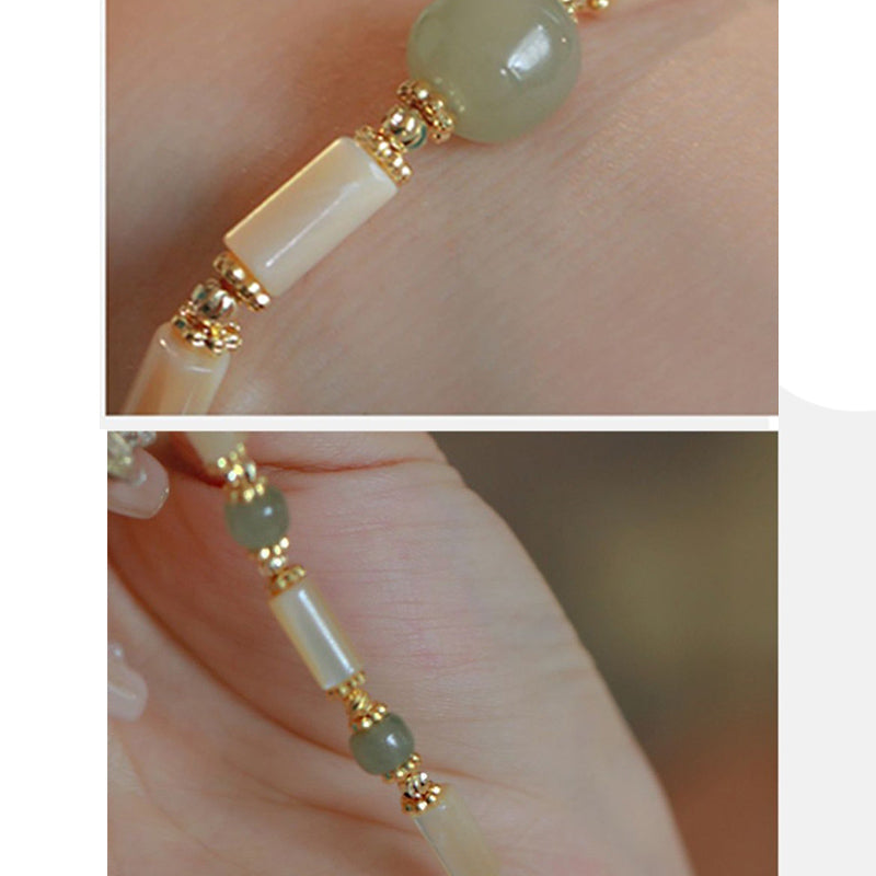 Bracciale Buddha Stones in pietra Tridacna placcata in oro 14K con perline di giada Hetian e motivo in bambù
