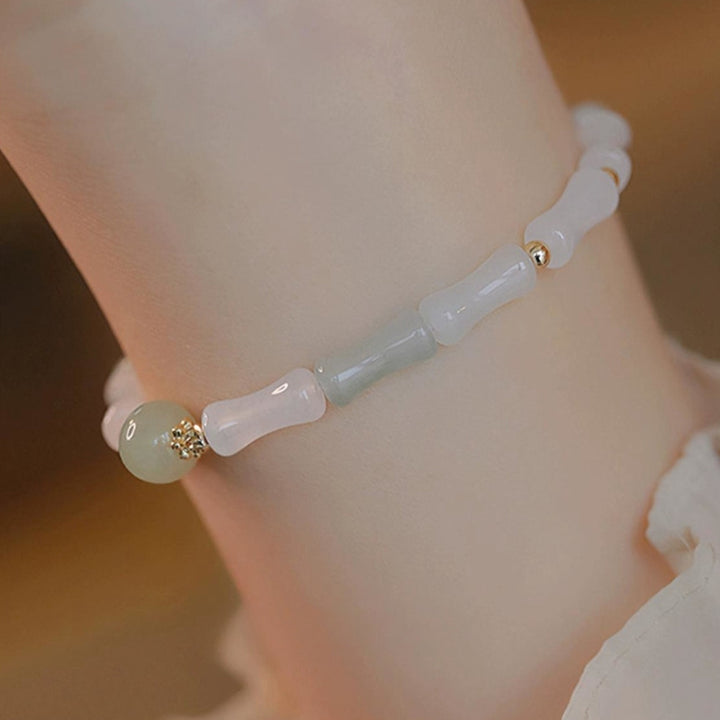 Braccialetto di protezione dalla fortuna con foglia di bambù e giada bianca Hetian placcato oro 14K Buddha Stones