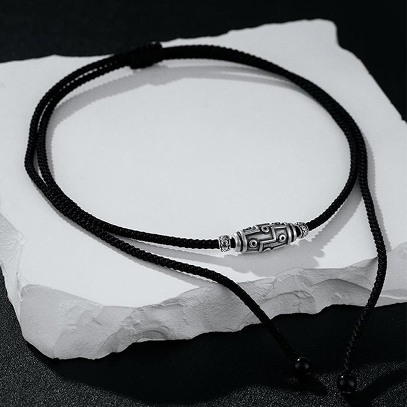 Collana con ciondolo in corda di protezione con motivo a nove occhi Dzi in argento sterling 999 Buddha Stones