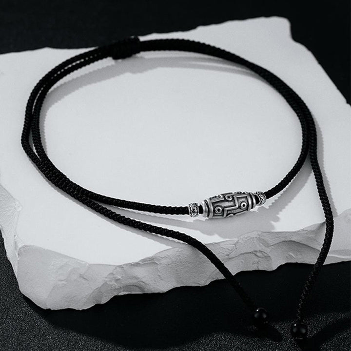 Collana con ciondolo in corda di protezione con motivo a nove occhi Dzi in argento sterling 999 Buddha Stones