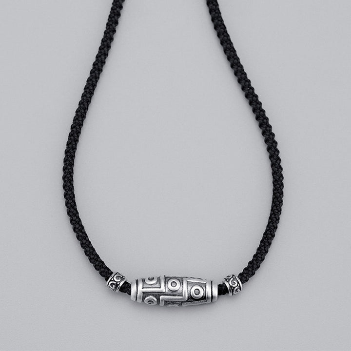 Collana con ciondolo in corda di protezione con motivo a nove occhi Dzi in argento sterling 999 Buddha Stones