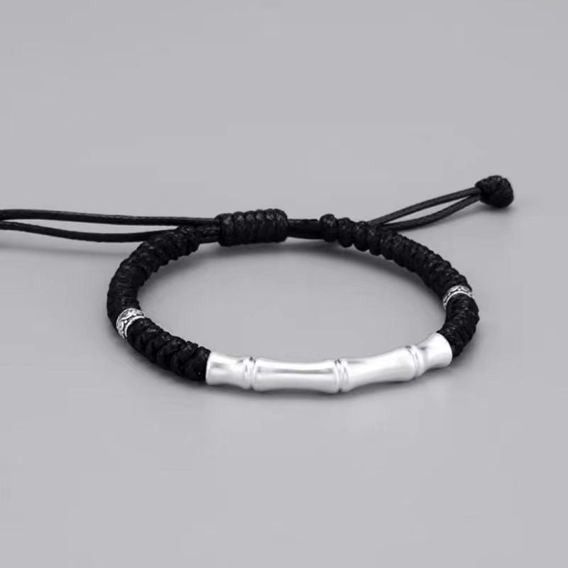 Braccialetto intrecciato con corda portafortuna a motivo osseo in argento sterling 999 Buddha Stones