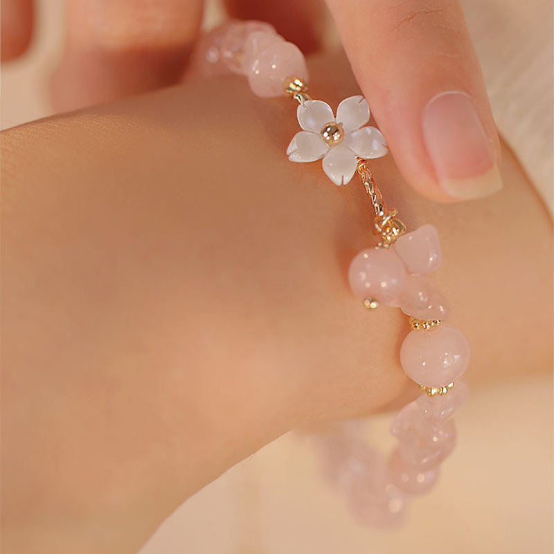 Bracciale Buddha Stones placcato oro 14k con fiore di cristallo rosa naturale