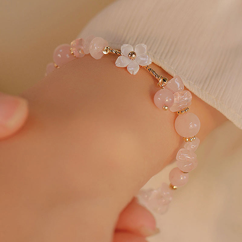 Bracciale Buddha Stones placcato oro 14k con fiore di cristallo rosa naturale