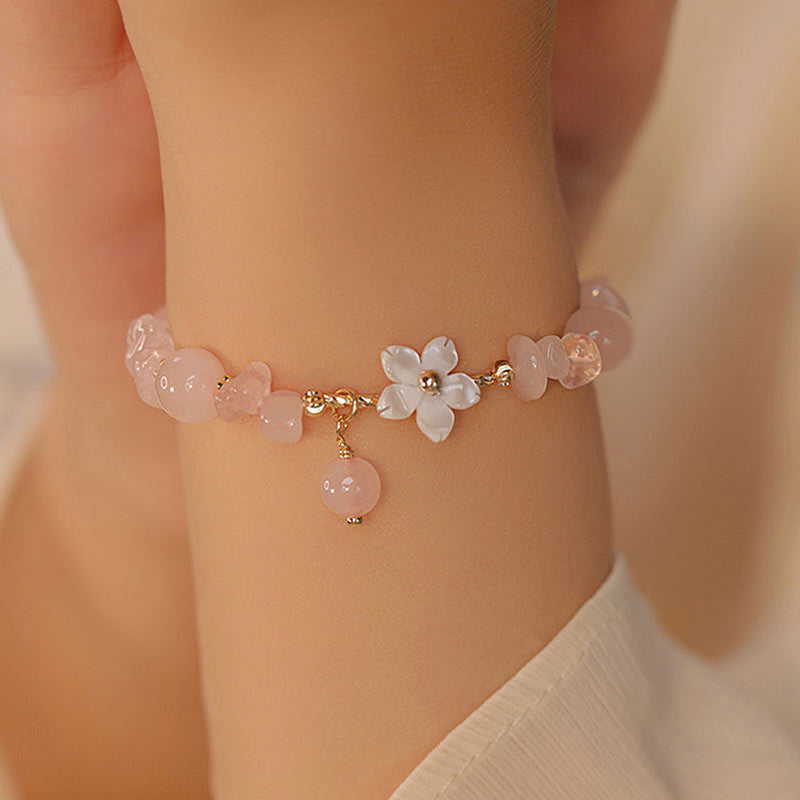 Bracciale Buddha Stones placcato oro 14k con fiore di cristallo rosa naturale