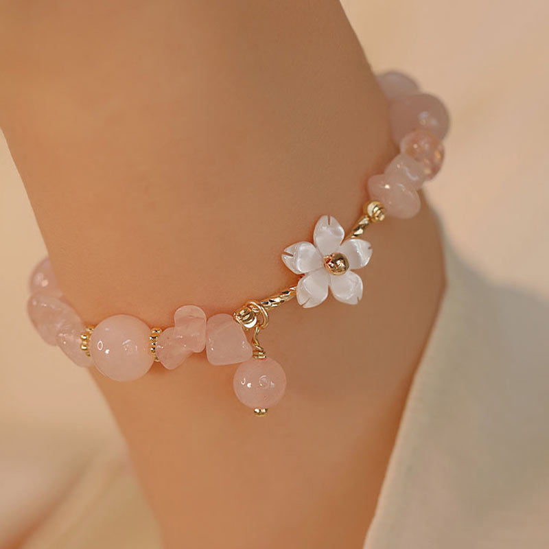 Bracciale Buddha Stones placcato oro 14k con fiore di cristallo rosa naturale