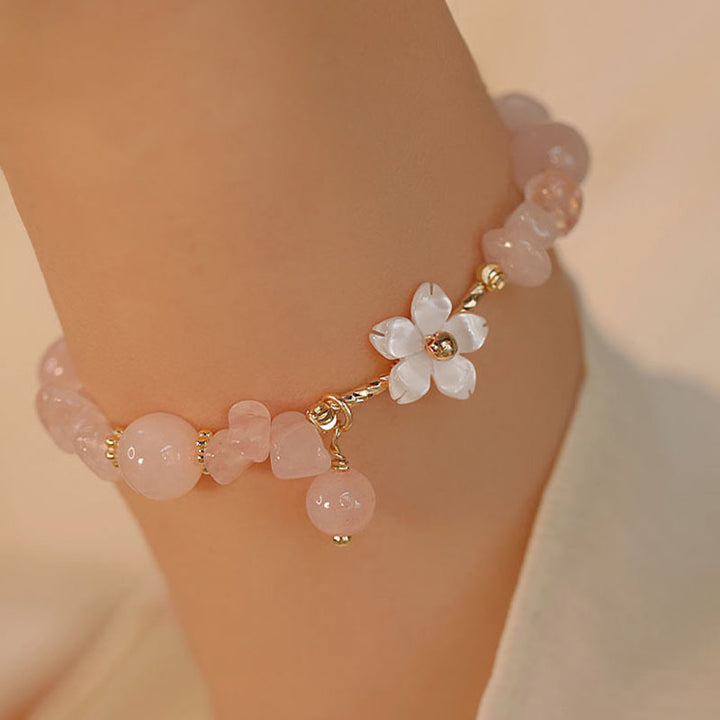 Bracciale Buddha Stones placcato oro 14k con fiore di cristallo rosa naturale