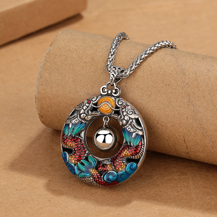 Buddha Stones Anno del Drago Draghi doppi colorati che giocano con perline Collana di protezione in rame con ciondolo